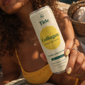 A close-up lifestyle shot of a person holding a can of Tide Collagen Sparkling Water. The can is white with a prominent yellow circle graphic and green text, covered in condensation.